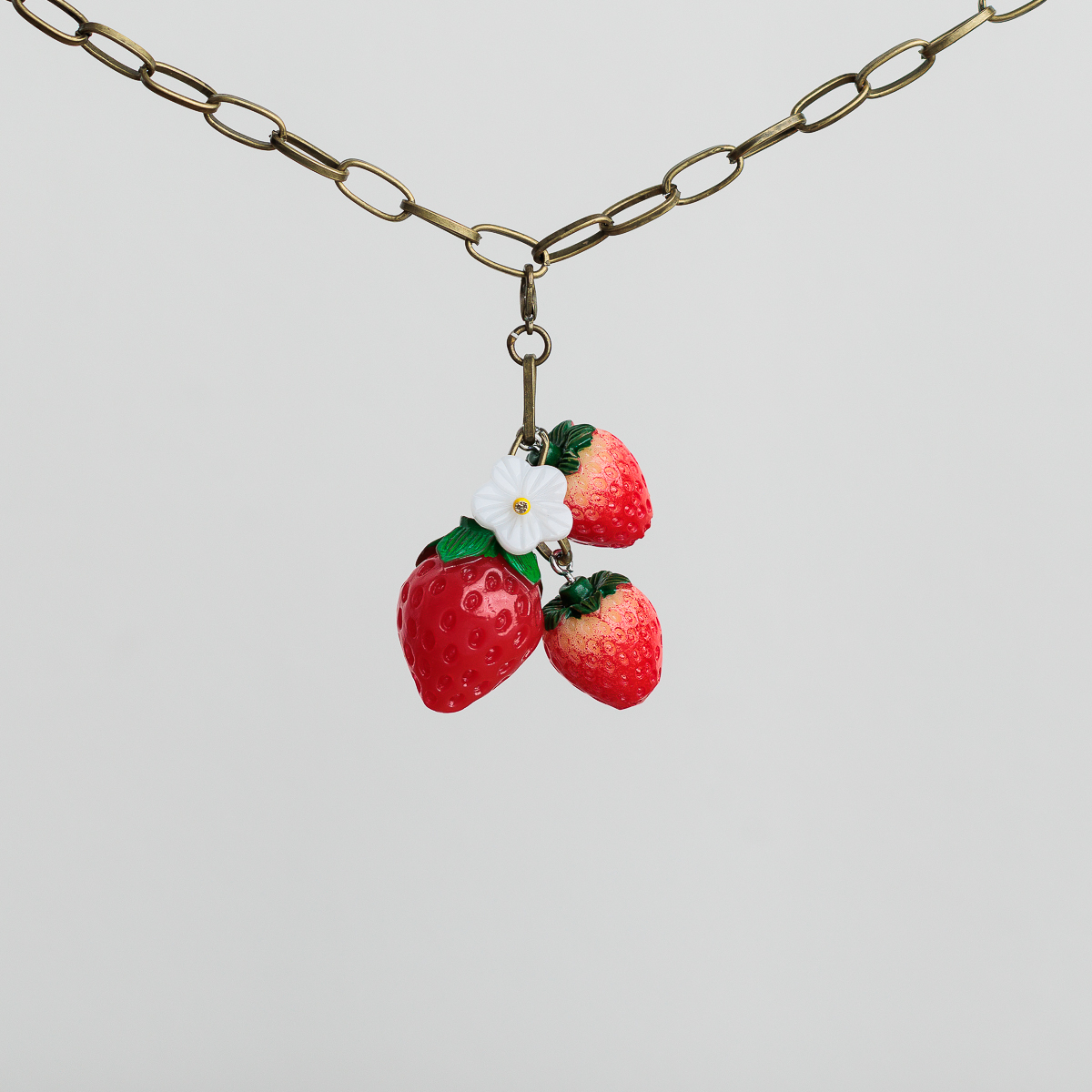 charm made of strawberries and flower for cottagecore costumes
